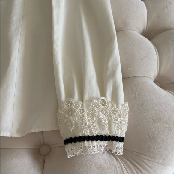 Authentic Gucci off-white with black trim blouse size Euro 38. - Picture 8 of 10